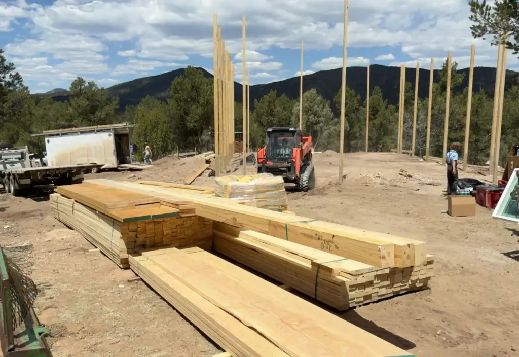 Pole barn framing package delivered to a Colorado jobsite