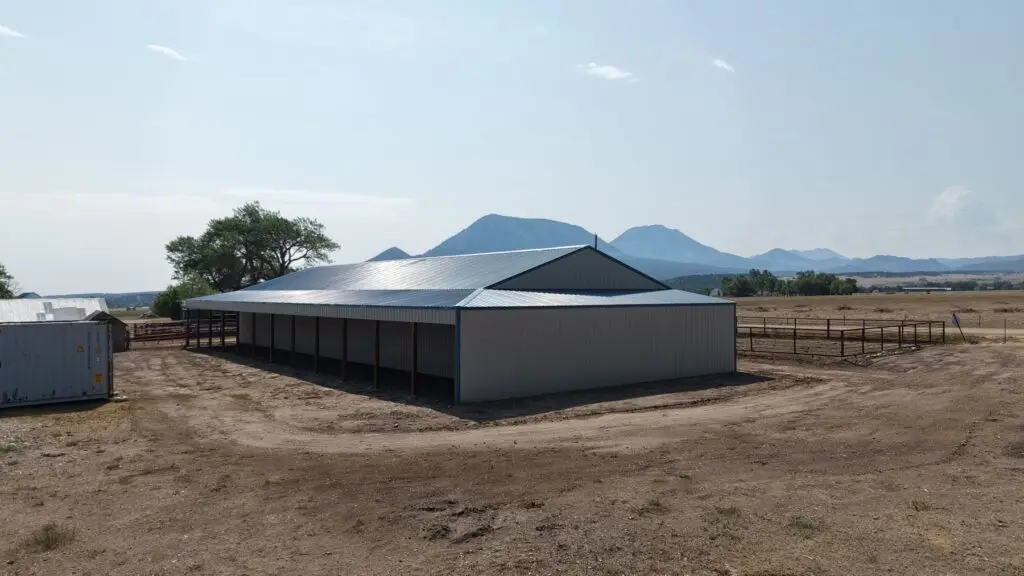 Covered 12-foot lean-to on a completed calving barn in Gardner, Colorado